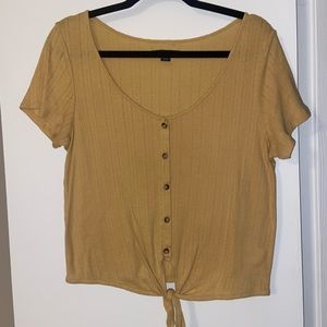 Buttoned top with tie at the bottom!